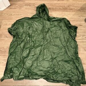 Adult Rain Poncho. One size. Never used. New without tags.